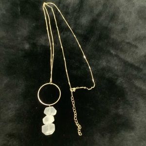 Row stone in a gold tone long chain necklace. New No Tag